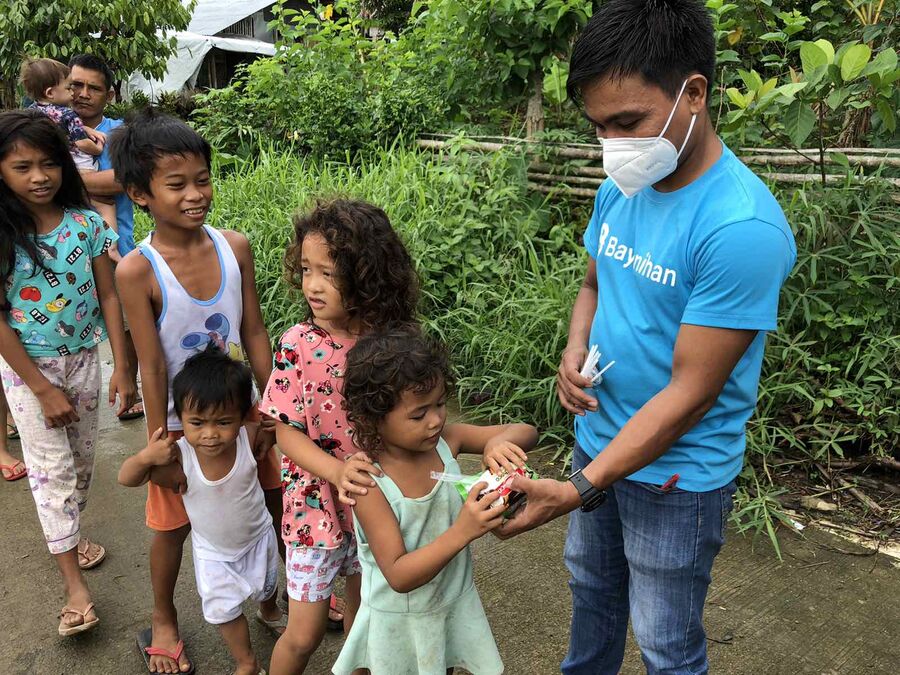 Bayanihan volunteers and the community they serve