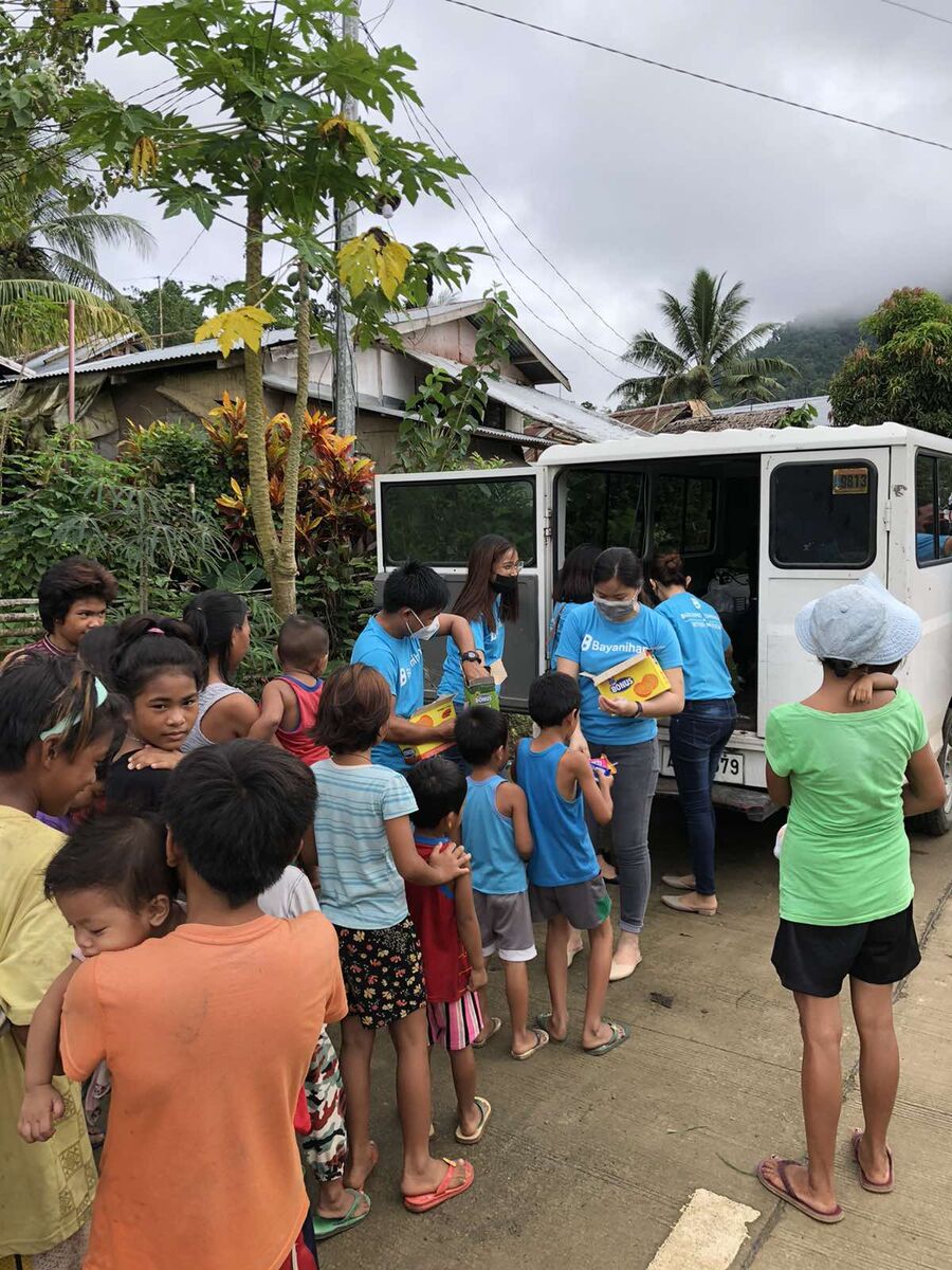 Bayanihan volunteers and the community they serve