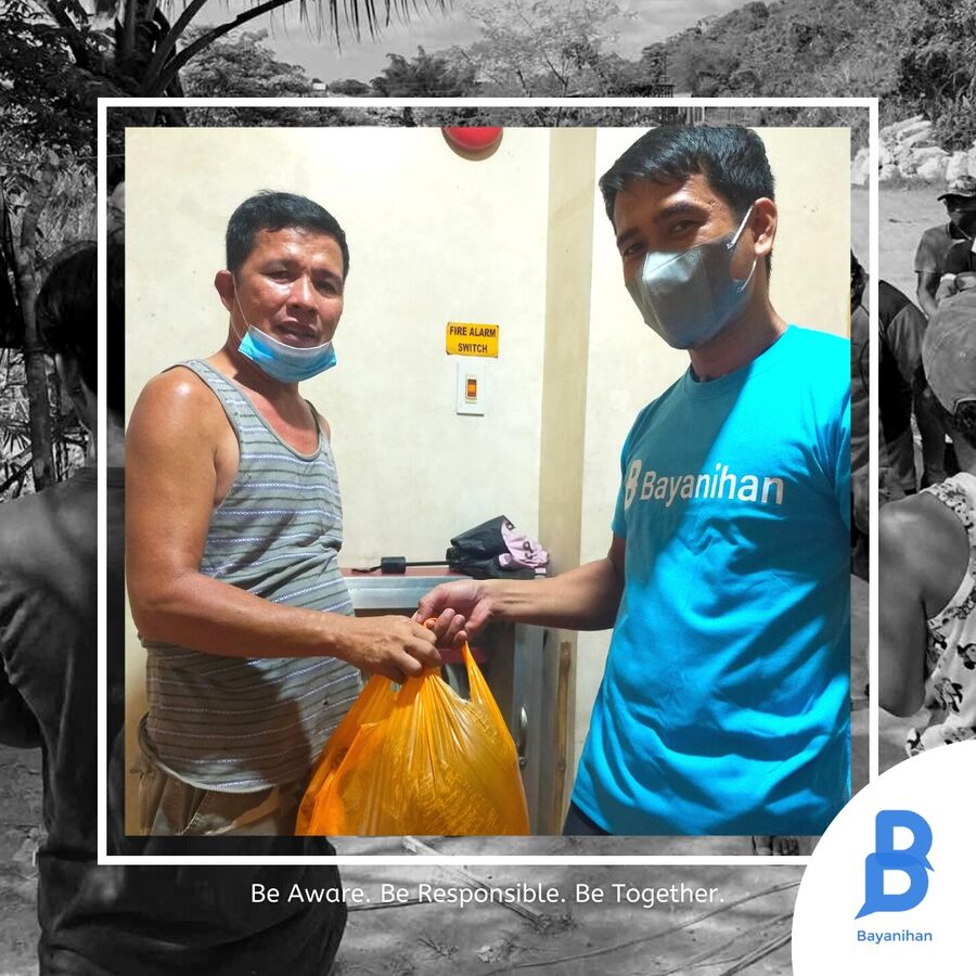 Bayanihan volunteers and the community they serve