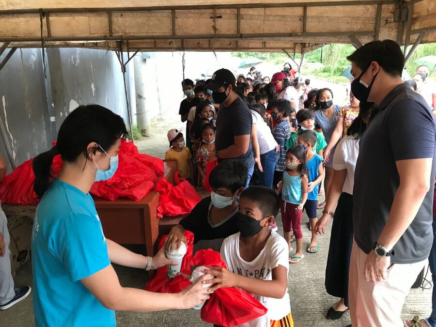 Bayanihan volunteers and the community they serve