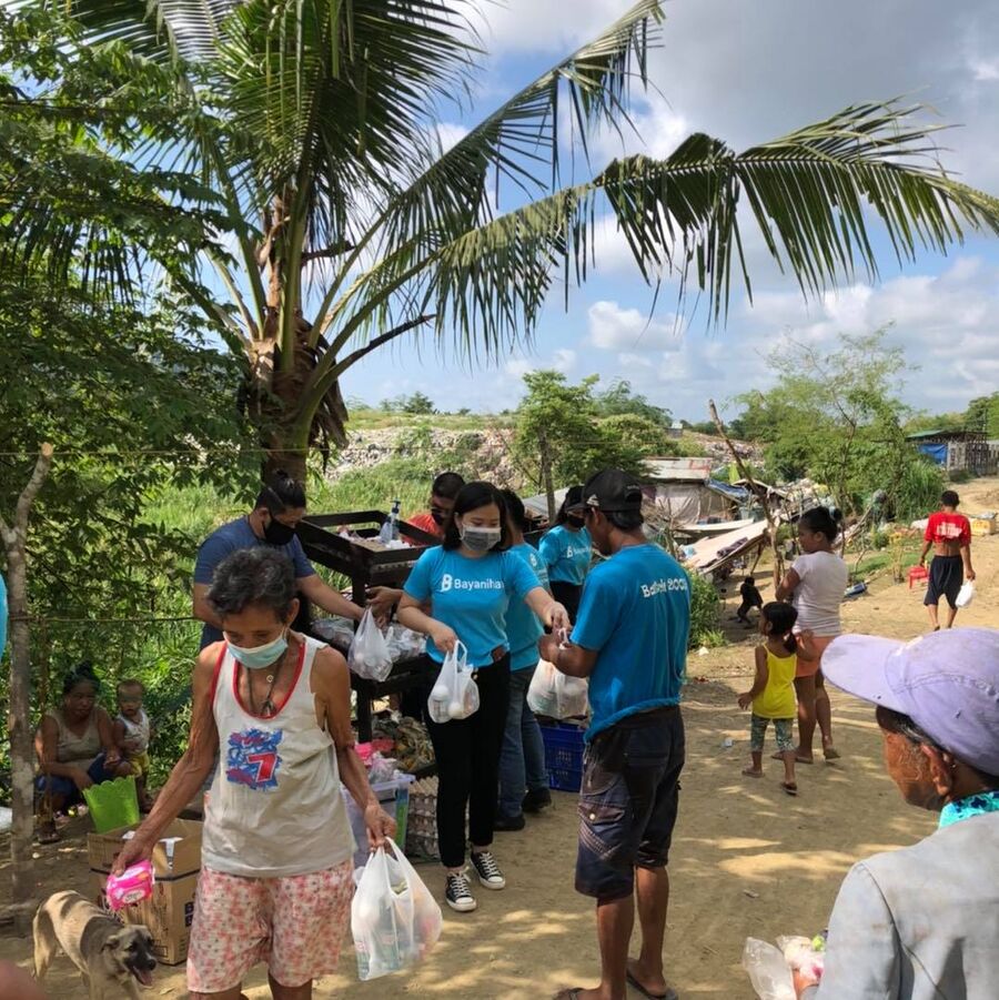 Bayanihan volunteers and the community they serve