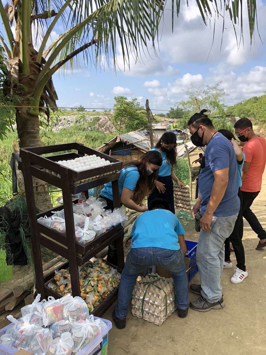 Bayanihan volunteers and the community they serve