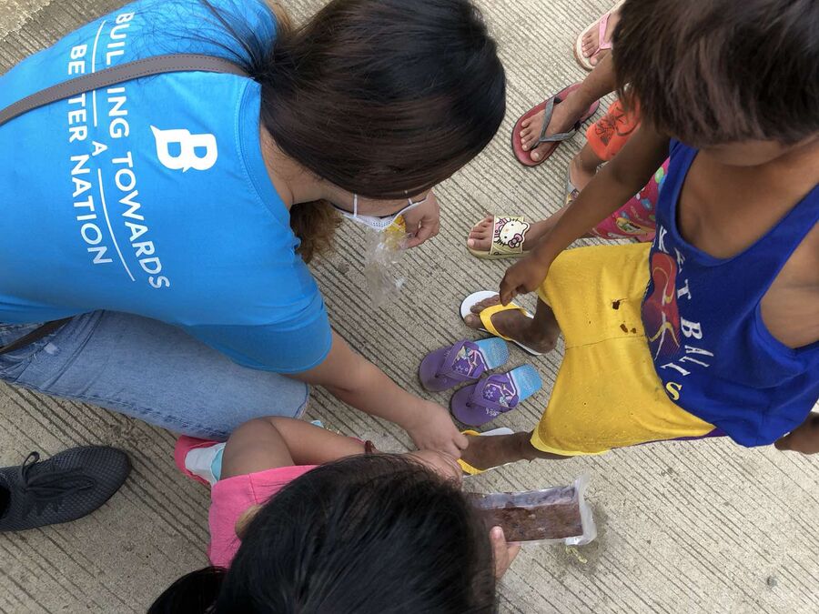 Bayanihan volunteers and the community they serve